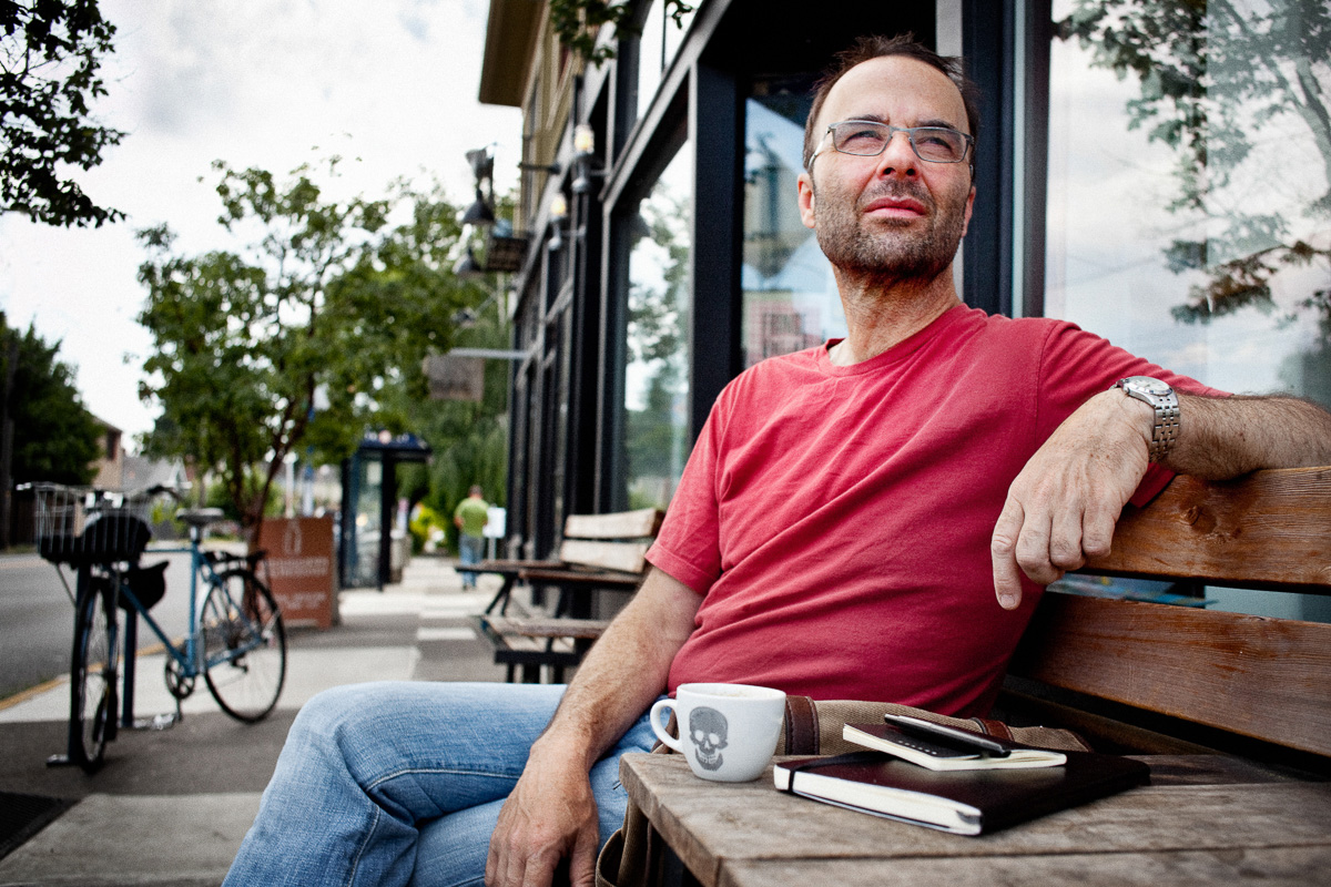 PSU Professor and writer on coffee shop bench